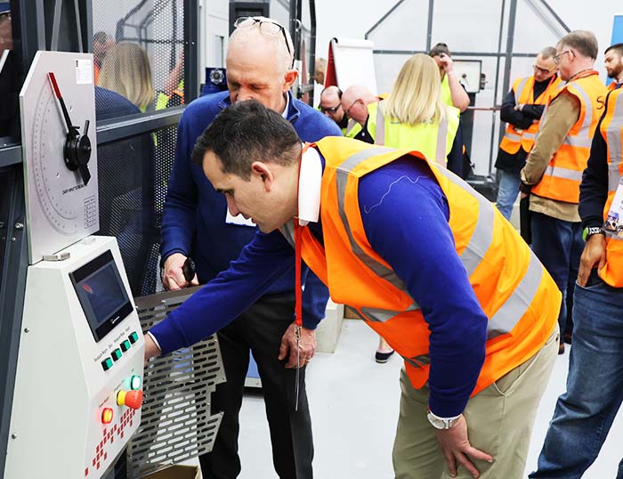 UKAS Testing - our chief metallurgist showing a customer how a Charpy impact test is performed.