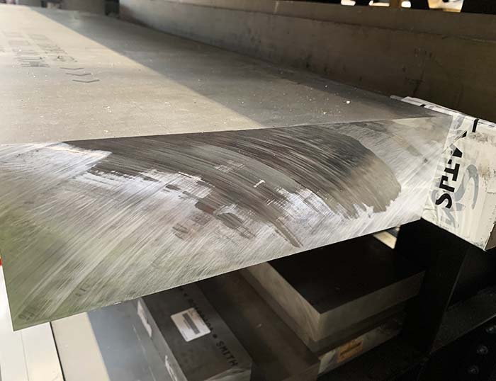 We use CNC and vertical saws to cut our aluminium plates to tight tolerances.