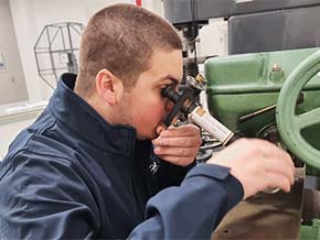 Hardness testing performed by one of our metallurgists.